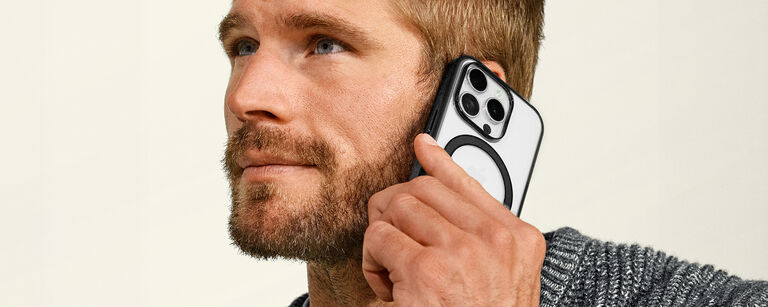 Man-Holding-Black-and-Clear-Minimalist-iPhone-Case